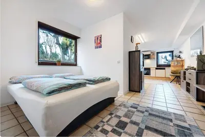 Ein Bett oder Betten in einem Zimmer der Unterkunft ruhige Wohnung im Schwarzwald (Pforzheim, OT Würm)