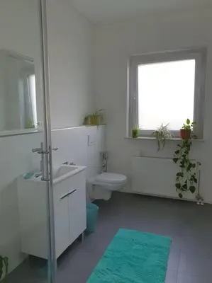 Ein Badezimmer in der Unterkunft Moderne 2 Zimmerwohnung/ Eggenstein/nähe KIT Nord