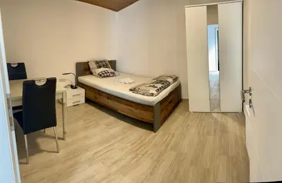 Ein Bett oder Betten in einem Zimmer der Unterkunft Ferien Wohnung