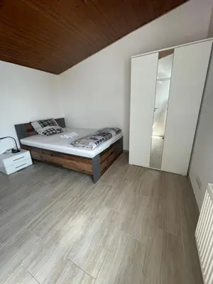 Ein Bett oder Betten in einem Zimmer der Unterkunft Ferien Wohnung