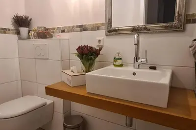 Ein Badezimmer in der Unterkunft Exklusive Wohnung mit herrlicher Terrasse und Garten