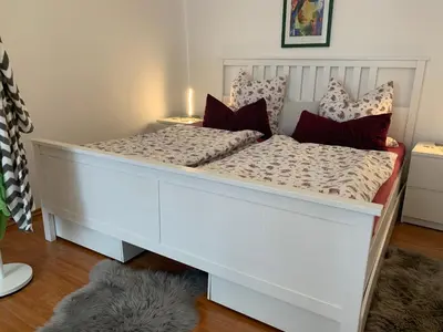 Ein Bett oder Betten in einem Zimmer der Unterkunft Wohnen am historischen Rathaus