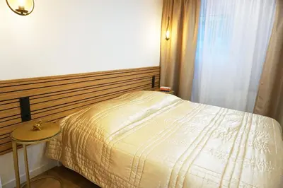 Ein Bett oder Betten in einem Zimmer der Unterkunft Greenline by Gregory - Apartment mit Garten in Mainz, ZDF Nähe