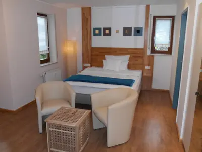 Ein Bett oder Betten in einem Zimmer der Unterkunft Warum ins Hotel