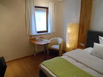 Ein Bett oder Betten in einem Zimmer der Unterkunft Warum ins Hotel
