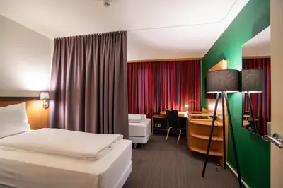 Ein Bett oder Betten in einem Zimmer der Unterkunft Best Western Conference Airporthotel Frankfurt Mörfelden