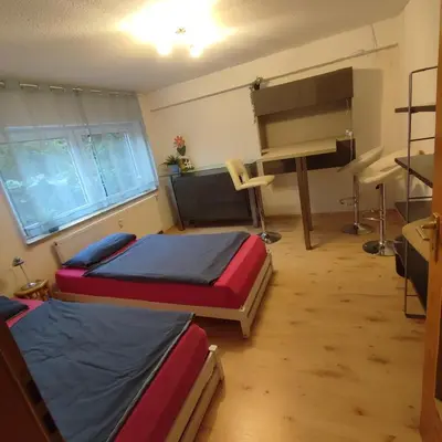 Ein Bett oder Betten in einem Zimmer der Unterkunft Siebeneichen