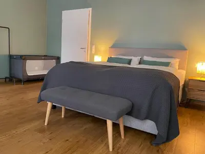 Ein Bett oder Betten in einem Zimmer der Unterkunft Ferienwohnung Hensel & Gretel