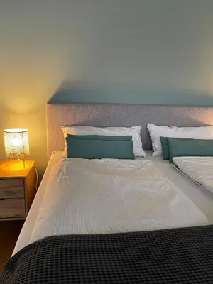 Ein Bett oder Betten in einem Zimmer der Unterkunft Ferienwohnung Hensel & Gretel