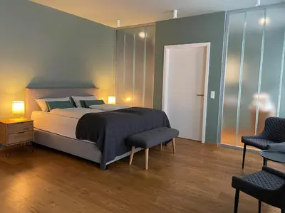 Ein Bett oder Betten in einem Zimmer der Unterkunft Ferienwohnung Hensel & Gretel