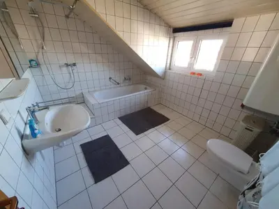 Ein Badezimmer in der Unterkunft Ferienwohnung