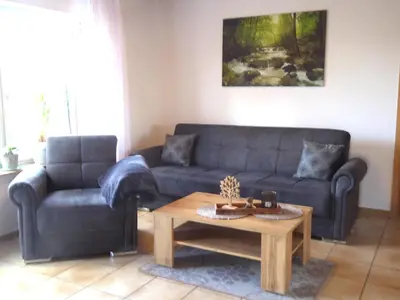 Ein Sitzbereich in der Unterkunft Ferienwohnung