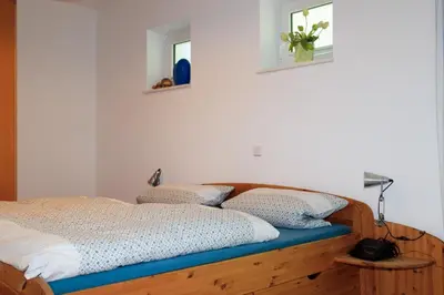 Ein Bett oder Betten in einem Zimmer der Unterkunft Ferienwohnung Kästle