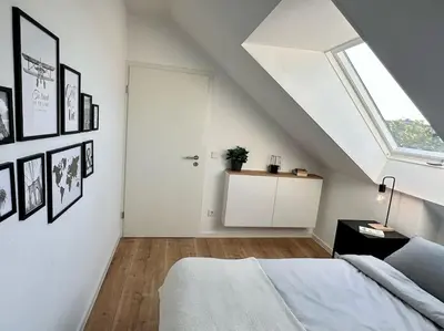 Ein Bett oder Betten in einem Zimmer der Unterkunft Stylisches Apartment in zentraler Lage - mit Klima