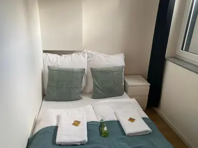 Ein Bett oder Betten in einem Zimmer der Unterkunft LUX Apartments