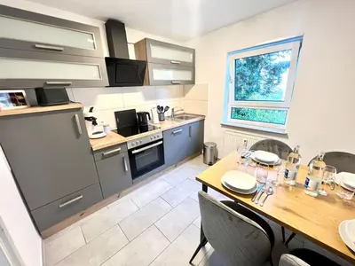 Küche/Küchenzeile in der Unterkunft Homely - modern - für 4 - Boxspringbetten - Internet