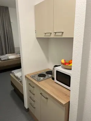 Küche/Küchenzeile in der Unterkunft Longhouse Aparthotel