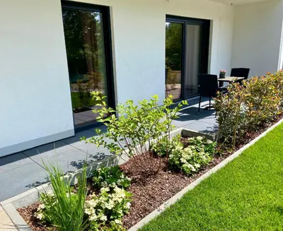 Ein Garten an der Unterkunft HALBSTÜCK - Ferienwohnungen am Kropsbachpark