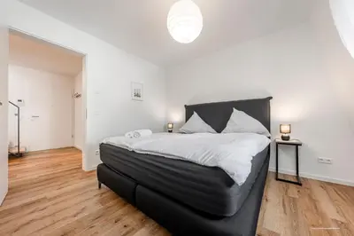 Ein Bett oder Betten in einem Zimmer der Unterkunft XXL Design-Appartement Artdesign - 8 Pers - nähe Speyer Mannheim Heidelberg
