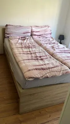 Ein Bett oder Betten in einem Zimmer der Unterkunft Smoke free small apartement with Garden View