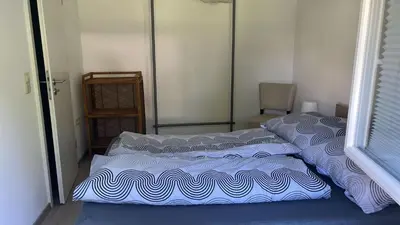 Ein Bett oder Betten in einem Zimmer der Unterkunft Smoke free small apartement with Garden View