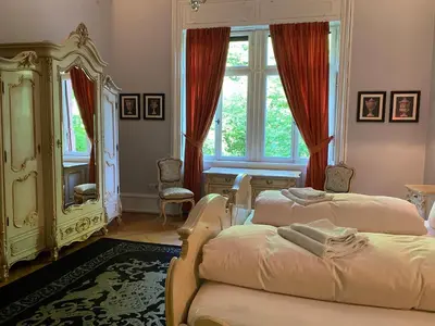 Ein Bett oder Betten in einem Zimmer der Unterkunft Schloss Langenzell, Grafensuite