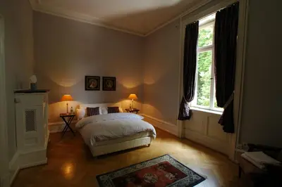 Ein Bett oder Betten in einem Zimmer der Unterkunft Schloss Langenzell, Grafensuite