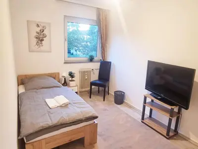 TV/Unterhaltungsangebot in der Unterkunft Spacious 4-Bedroom Apartment with Balcony near Frankfurt