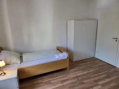 Ein Bett oder Betten in einem Zimmer der Unterkunft Privatzimmer an der Universitätsklinik Mainz-sehr zentral