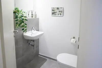 Ein Badezimmer in der Unterkunft NIRO I Design City Apartment, modern, ebenerdig, 3 Schlafzimmer