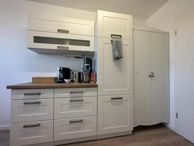 Küche/Küchenzeile in der Unterkunft Hellenbrand: Stilvolles Apartment über den Dächern