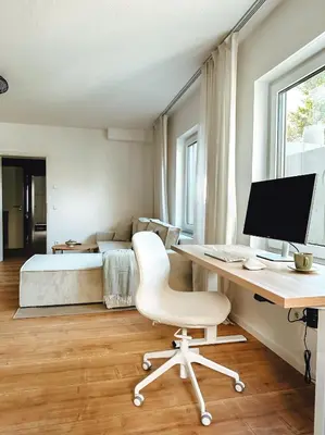 TV/Unterhaltungsangebot in der Unterkunft Modernes Apartment 5 Min zur Messe Parkplatz