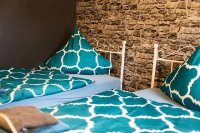 Ein Bett oder Betten in einem Zimmer der Unterkunft Kleines Häuschen für Monteure