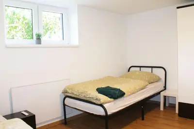 Ein Bett oder Betten in einem Zimmer der Unterkunft Ruhig gelegenes Apartment