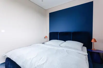 Ein Bett oder Betten in einem Zimmer der Unterkunft Exklusive Design Appartement Deep Blue Neubau