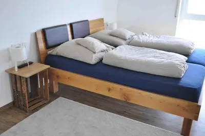 Ein Bett oder Betten in einem Zimmer der Unterkunft 3 Zimmer Neubauwohnung in der schwäbischen Toskana