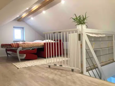 Ein Bett oder Betten in einem Zimmer der Unterkunft 3 Zimmer Neubauwohnung in der schwäbischen Toskana