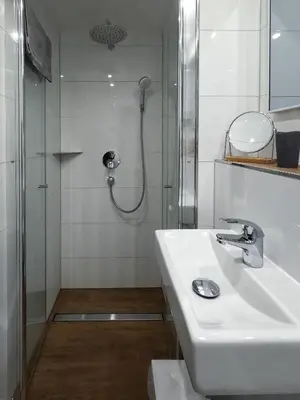 Ein Badezimmer in der Unterkunft Hotel Sonnenhof Garni