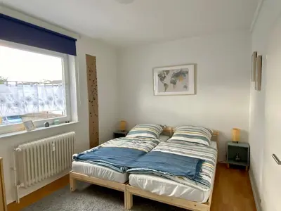 Ein Bett oder Betten in einem Zimmer der Unterkunft Die 2eitwohnung