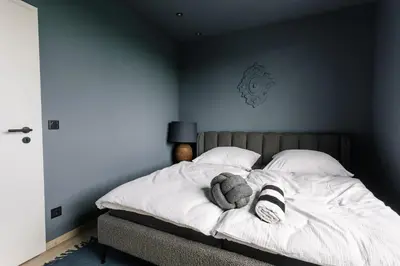 Ein Bett oder Betten in einem Zimmer der Unterkunft Exklusive Design Appartement Magnolia Neubau