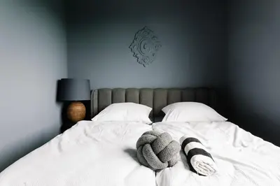 Ein Bett oder Betten in einem Zimmer der Unterkunft Exklusive Design Appartement Magnolia Neubau