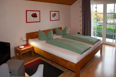 Ein Bett oder Betten in einem Zimmer der Unterkunft Chefs Gästezimmer
