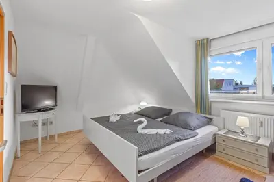 Ein Bett oder Betten in einem Zimmer der Unterkunft Family and Friends Ludwigshafen