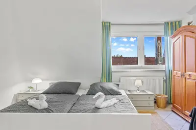 Ein Bett oder Betten in einem Zimmer der Unterkunft Family and Friends Ludwigshafen