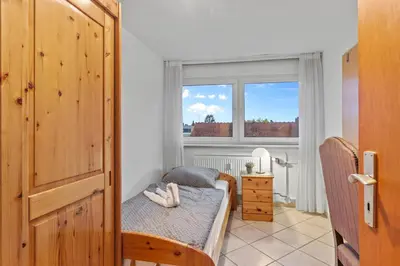 Ein Bett oder Betten in einem Zimmer der Unterkunft Family and Friends Ludwigshafen