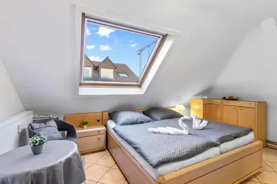 Ein Bett oder Betten in einem Zimmer der Unterkunft Family and Friends Ludwigshafen