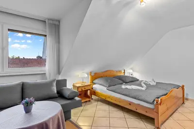 Ein Bett oder Betten in einem Zimmer der Unterkunft Family and Friends Ludwigshafen