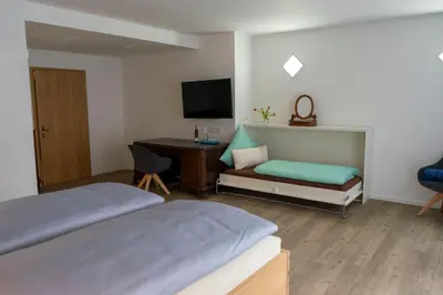Ein Bett oder Betten in einem Zimmer der Unterkunft Amtsgerichts Blick