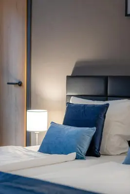 Ein Bett oder Betten in einem Zimmer der Unterkunft Hotel Wegener