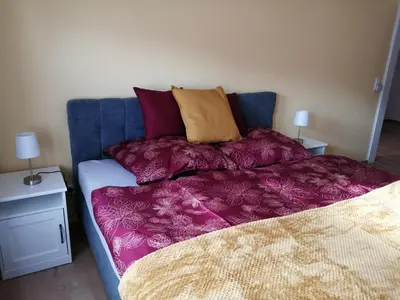 Ein Bett oder Betten in einem Zimmer der Unterkunft Ferienwohnung im Fachwerkhaus